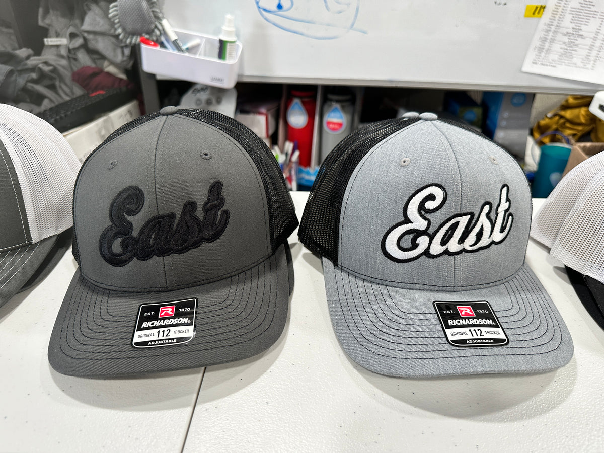 East Embroidered Trucker Hat